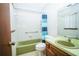 Standard bathroom with a tub and shower combination at 3990 Se 20Th Ct, Ocala, FL 34480
