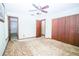 Bedroom featuring a ceiling fan, closet, and neutral color palette at 3990 Se 20Th Ct, Ocala, FL 34480