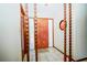 Welcoming foyer with decorative wood columns and tile flooring, offering a glimpse into the home's interior at 3990 Se 20Th Ct, Ocala, FL 34480