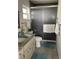 Bathroom featuring a shower with glass doors, a white vanity, and tile floors at 8533 Sw 93Rd Pl # A, Ocala, FL 34481