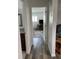 Hallway view showcasing the home's cohesive design and bright, welcoming atmosphere at 8533 Sw 93Rd Pl # A, Ocala, FL 34481
