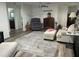 Spacious living room featuring wood floors, neutral walls, and comfortable seating at 8533 Sw 93Rd Pl # A, Ocala, FL 34481