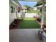 Enjoy outdoor living on this patio with a well-manicured yard and white picket fence at 8533 Sw 93Rd Pl # A, Ocala, FL 34481