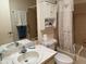Cozy bathroom with marble countertop, toilet, tub and shower combination at 8665 Sw 94Th St # C, Ocala, FL 34481