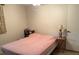 Cozy bedroom featuring tiled floor and a neutral color scheme at 8665 Sw 94Th St # C, Ocala, FL 34481