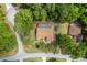 Aerial view of a single Gathering home with screened pool, set on a wooded lot at 9573 Sw 196Th Avenue Rd, Dunnellon, FL 34432