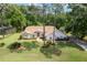 Charming single-story home featuring a well-manicured front lawn and inviting entryway at 9573 Sw 196Th Avenue Rd, Dunnellon, FL 34432