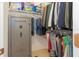 Walk-in closet with wire shelves and organized storage solutions and a safe at 11395 Se 108Th Terrace Rd, Belleview, FL 34420
