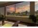 Relaxing view of a beautiful landscape with serene lake in the distance from the enclosed porch at 11395 Se 108Th Terrace Rd, Belleview, FL 34420