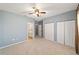 Spacious bedroom featuring plush carpet, ensuite bathroom and ample closet space at 11427 Sw 82Nd Ave, Ocala, FL 34481