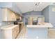 Well-lit kitchen with tiled flooring, stainless steel appliances, and ample cabinet space at 11427 Sw 82Nd Ave, Ocala, FL 34481