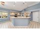 Bright kitchen featuring tiled floors, stainless steel appliances, and ample counter space at 11427 Sw 82Nd Ave, Ocala, FL 34481
