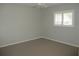 Bedroom with ceiling fan and window at 11495 Sw 138Th Ln, Dunnellon, FL 34432