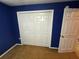 Bedroom closet with bi-fold doors and a standard rod and shelf at 15115 Se 94Th Ct, Summerfield, FL 34491