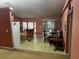 Open kitchen and dining area with breakfast bar, ample countertops, and room to enjoy meals at 15115 Se 94Th Ct, Summerfield, FL 34491