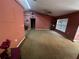 Carpeted living room with neutral walls and ceiling fan ready for your personal touch at 15115 Se 94Th Ct, Summerfield, FL 34491