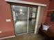 Indoor area featuring sliding glass doors and tile flooring at 15115 Se 94Th Ct, Summerfield, FL 34491