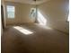 Large bedroom with ceiling fan and generous natural light from multiple windows at 1703 Sanderling St, The Villages, FL 32162