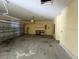 Attached two-car garage offers ample parking and storage space at 1703 Sanderling St, The Villages, FL 32162