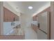 Well-lit kitchen with stainless steel appliances, granite countertops, ample cabinet space and a skylight at 17475 Se 107Th Ct, Summerfield, FL 34491