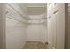 Bright walk-in closet with built-in wire shelving for optimal storage and organization at 17475 Se 107Th Ct, Summerfield, FL 34491