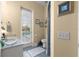 Bathroom with a view of the pool area from the window at 2358 Nw 59Th Ter, Ocala, FL 34482