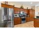 This updated kitchen features stainless steel appliances, granite countertops, and generous cabinet storage for all your needs at 2358 Nw 59Th Ter, Ocala, FL 34482