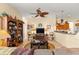 Inviting living space featuring a cozy seating area, stylish furnishings, and a seamless flow to the kitchen area at 2358 Nw 59Th Ter, Ocala, FL 34482