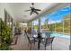 Screened-in patio with ceiling fans and views of the sparkling pool at 2358 Nw 59Th Ter, Ocala, FL 34482