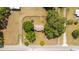 Birds-eye view of a home on a spacious lot surrounded by mature trees, offering privacy and a tranquil setting at 2720 Se 145Th St, Summerfield, FL 34491