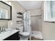 Bright bathroom with a walk-in shower, modern fixtures, and elegant design at 2720 Se 145Th St, Summerfield, FL 34491
