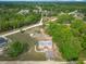 Aerial view of the home showcasing the large lot with mature trees and nearby roads at 2800 Sw 141St Ct, Ocala, FL 34481
