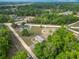Aerial view of home showcasing property and neighborhood with mature trees at 2800 Sw 141St Ct, Ocala, FL 34481