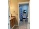 Cozy bathroom featuring a vanity sink, toilet, and shower with a stylish curtain at 3021 Se 5Th Ter # A, Ocala, FL 34471