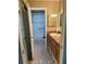Clean bathroom highlighting a vanity with storage, a mirror, and an accessible shower and bathtub combination at 3021 Se 5Th Ter # A, Ocala, FL 34471