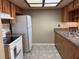 Functional kitchen featuring white appliances, ample cabinet space, and a clean, practical design at 3021 Se 5Th Ter # A, Ocala, FL 34471