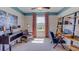 This home office includes modern furnishings, a work desk, and natural lighting at 373 Hickory Course Trl, Ocala, FL 34472