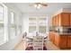 Bright breakfast nook with multiple windows and stylish accents at 4945 Nw 35Th Lane Rd, Ocala, FL 34482