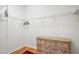 Walk-in closet offers wire shelving for ample storage and a dresser on hardwood floors at 4945 Nw 35Th Lane Rd, Ocala, FL 34482