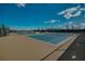 Community tennis courts with blue playing surfaces and ample space for recreational enjoyment at 4945 Nw 35Th Lane Rd, Ocala, FL 34482