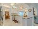 Kitchen featuring granite countertops, white cabinets, and modern stainless steel appliances at 5195 Nw 21St Loop, Ocala, FL 34482