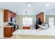 Modern kitchen boasting granite countertops, stainless steel appliances, and ample cabinet space at 5770 Sw 89Th Pl, Ocala, FL 34476