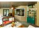 Covered lanai space featuring a ceiling fan and wicker furniture at 5770 Sw 89Th Pl, Ocala, FL 34476