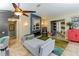 Inviting living space featuring comfortable seating, modern fireplace, and stylish decorative accents at 5770 Sw 89Th Pl, Ocala, FL 34476