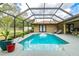 Inviting pool in screened-in lanai at 5770 Sw 89Th Pl, Ocala, FL 34476