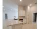 Beautiful kitchen featuring granite countertops, stainless steel appliances, and modern lighting at 6104 Sw 147Th Street Rd, Ocala, FL 34473