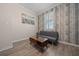 Home office featuring plank flooring, neutral walls, and lots of sunlight at 6437 Sw 45Th Ave, Ocala, FL 34474