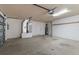 Spacious garage featuring ample room for parking and storage, including a water heater and utility connections at 802 Se 50Th Ter, Ocala, FL 34471