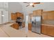Well-equipped kitchen features stainless steel appliances, ample cabinets, and tile flooring at 802 Se 50Th Ter, Ocala, FL 34471