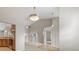 Open-concept living space with recessed lighting, carpet flooring, and a modern kitchen nearby at 802 Se 50Th Ter, Ocala, FL 34471
